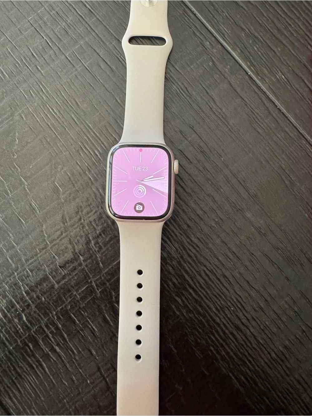 Apple Watch with Pink Display and Light Gray Band